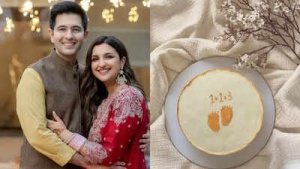 Parineeti Chopra and Raghav Chadha Expecting First Child: Couple Announces Pregnancy with Sweet Photo
Hoặc:
Parineeti Chopra and Raghav Chadha Announce They're Expecting: 'Our Little Universe Is On Its Way'