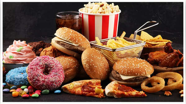 A person experiencing loss of appetite, a potential early symptom of liver disease
