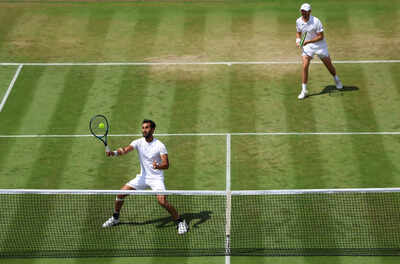 Yuki Bhambri playing forehand at Wimbledon 2025
