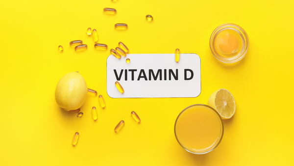Vitamin D supplement pills and a bottle
